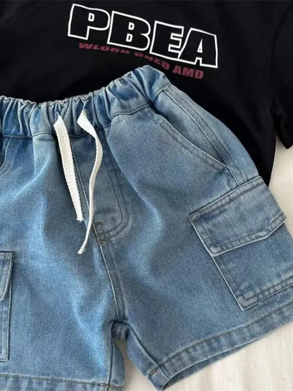 Girls' Denim Bermuda Shorts with Cargo Pockets and Drawstring — a pair designed to be worn everywhere