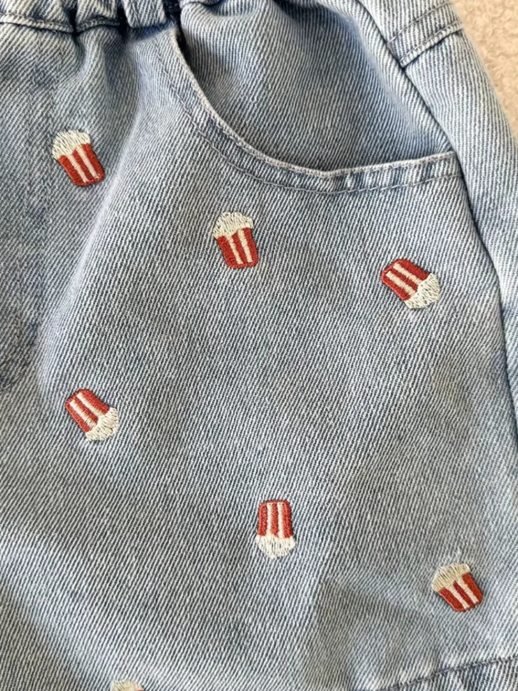 Girls' Denim Shorts with Popcorn Embroidery — a pair designed to be worn everywhere