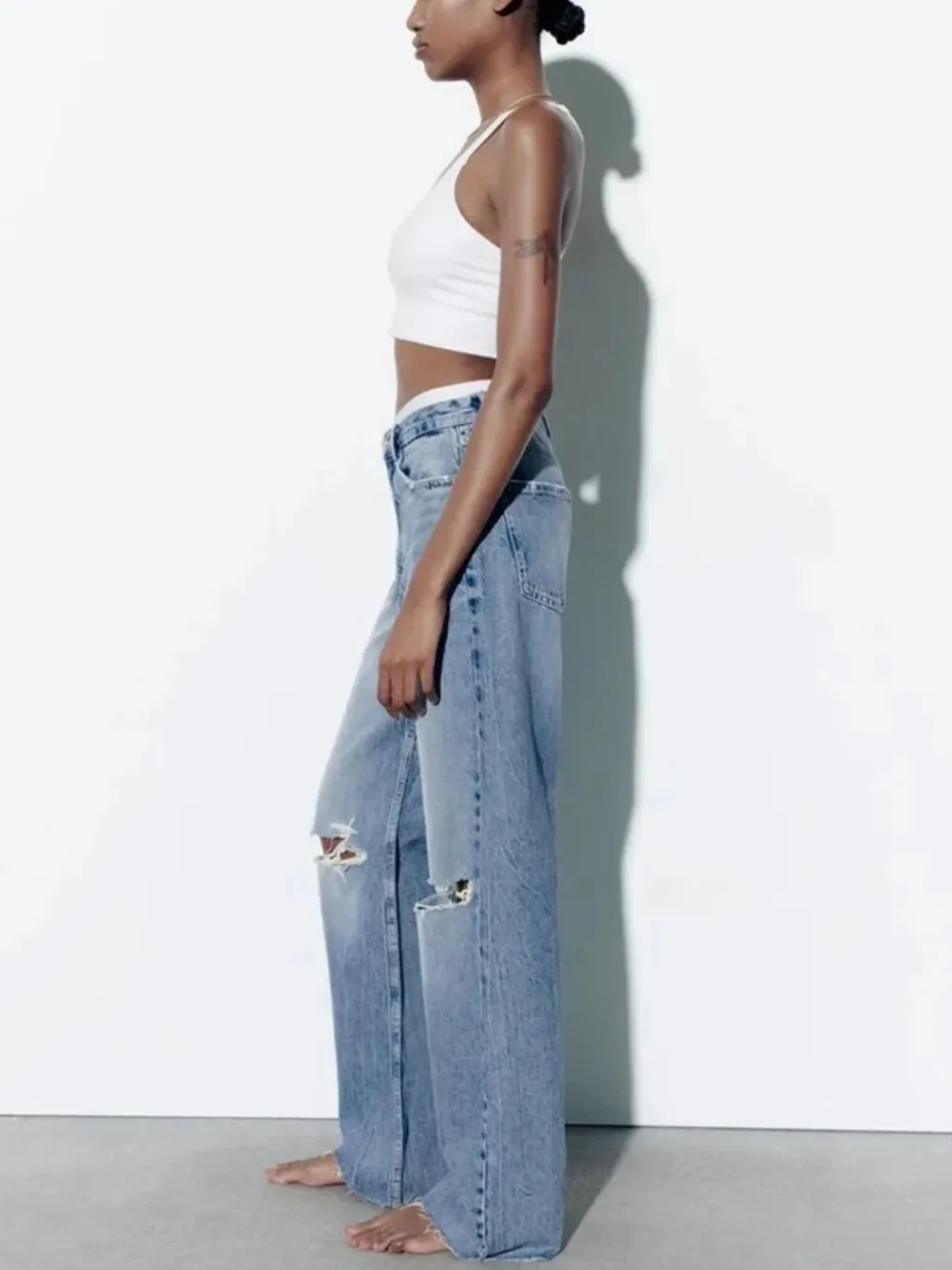 Light Blue High-Waisted Ripped Boyfriend Jeans — endless ways to style it