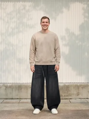 Men's Balloon-Fit Jeans in Black Denim — view 1
