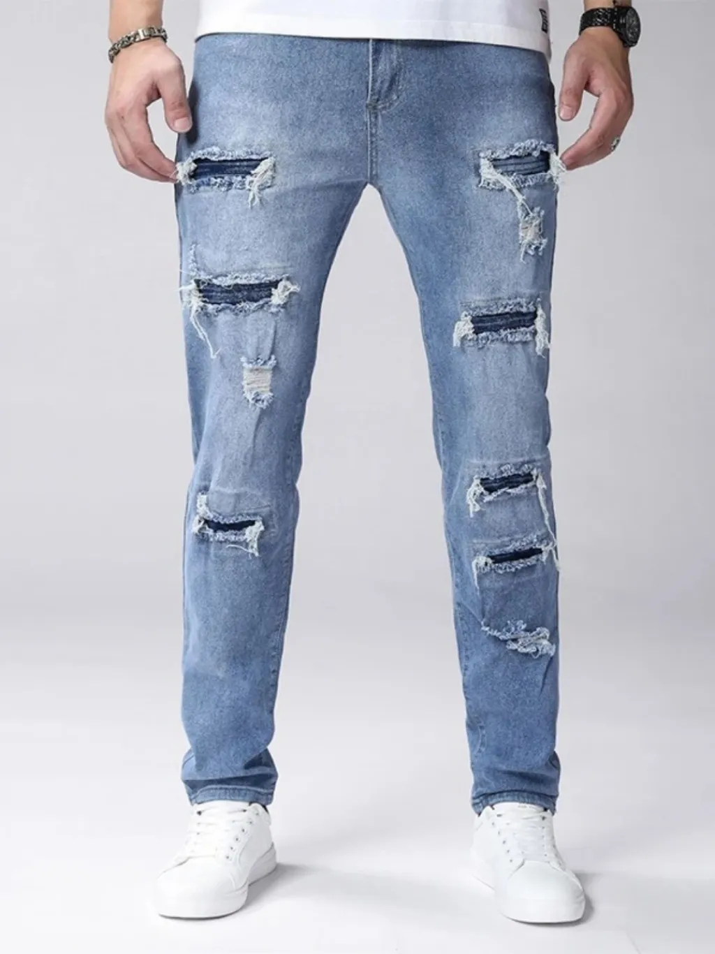 Men's Light Blue Grunge Ripped Skinny Jeans — a pair designed to be worn everywhere