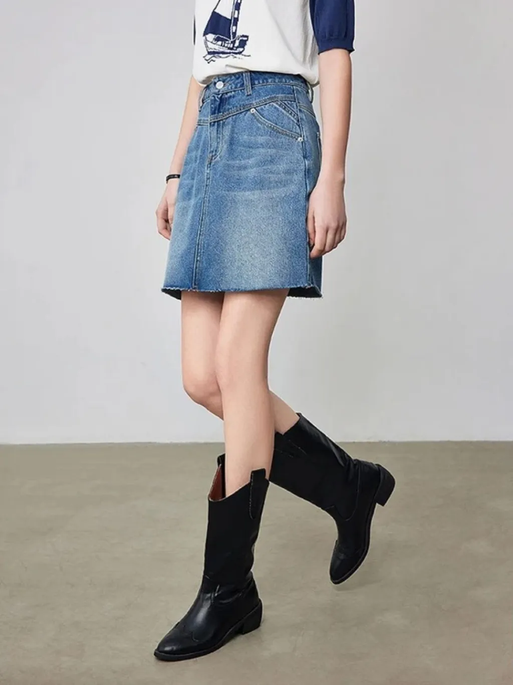 Short Washed Blue Denim Skirt with Graphic Seams — quality denim, made to last