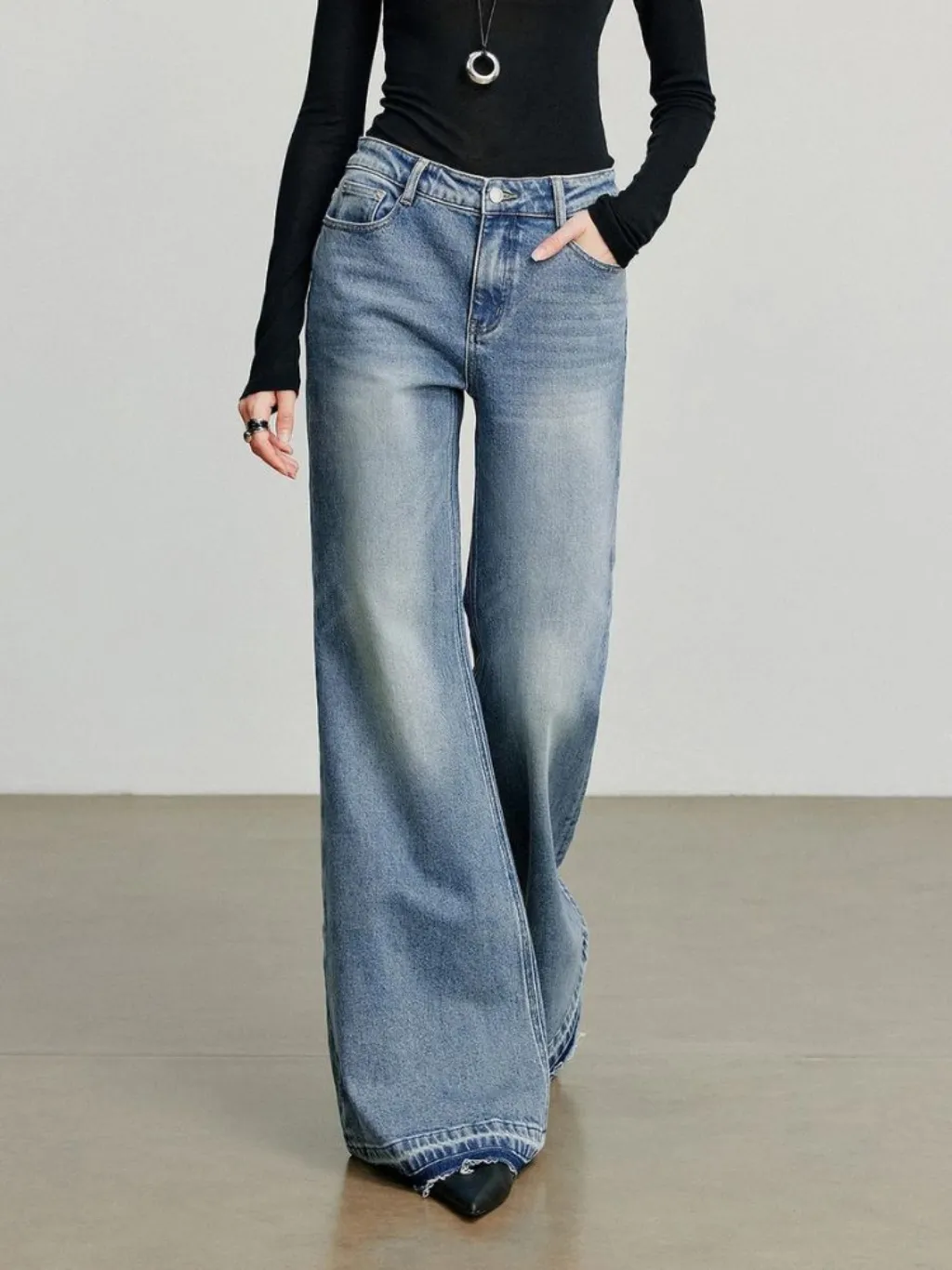 Washed Flared Jeans with Frayed Hems — a pair designed to be worn everywhere