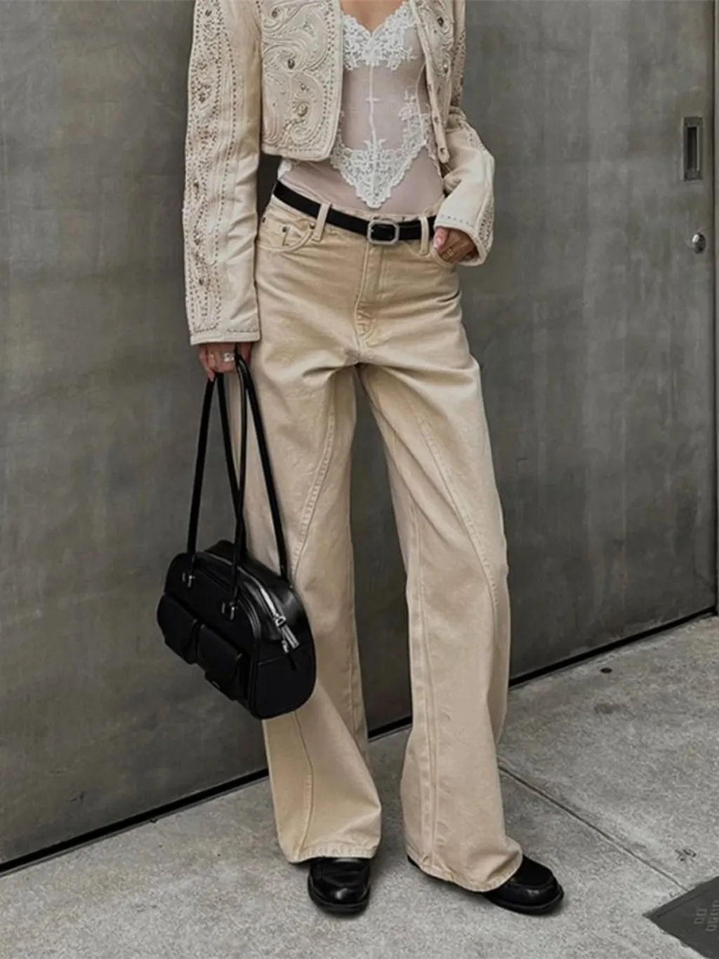 Women's Beige Baggy Jeans with Studs & Stitching — a pair designed to be worn everywhere