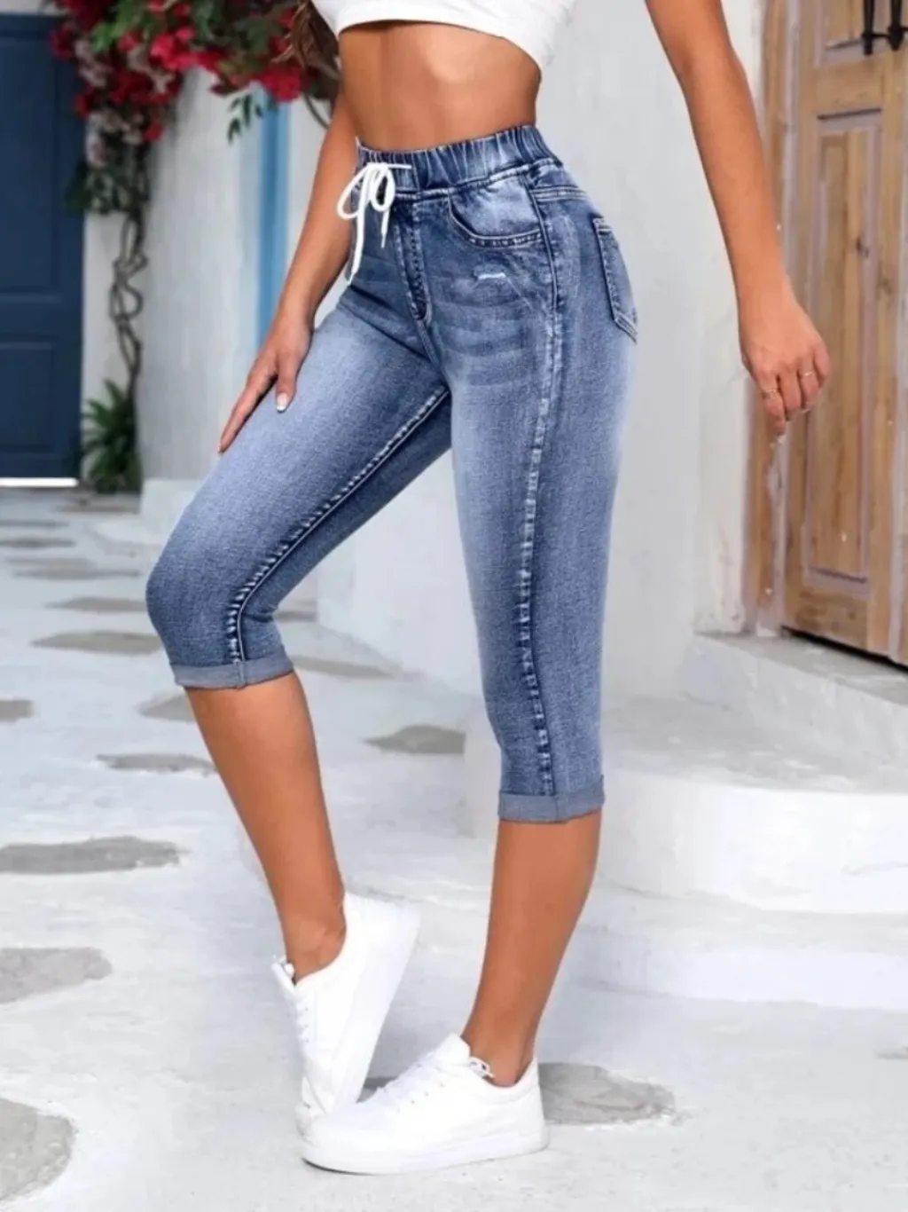 Women's Blue Washed Cropped Jeans with Drawstring — a pair designed to be worn everywhere