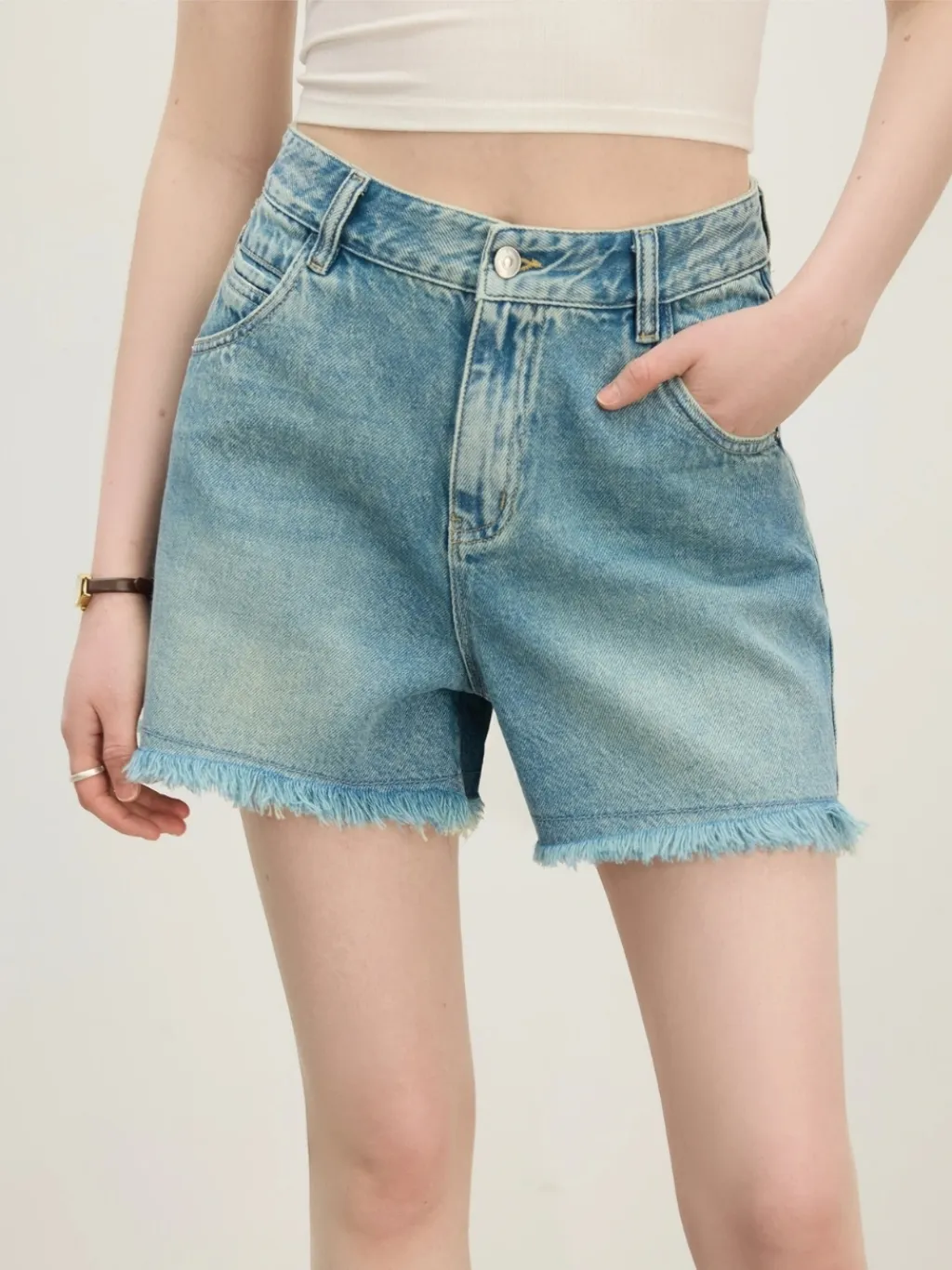 Women's Light Blue Frayed Hem Denim Shorts — a pair designed to be worn everywhere