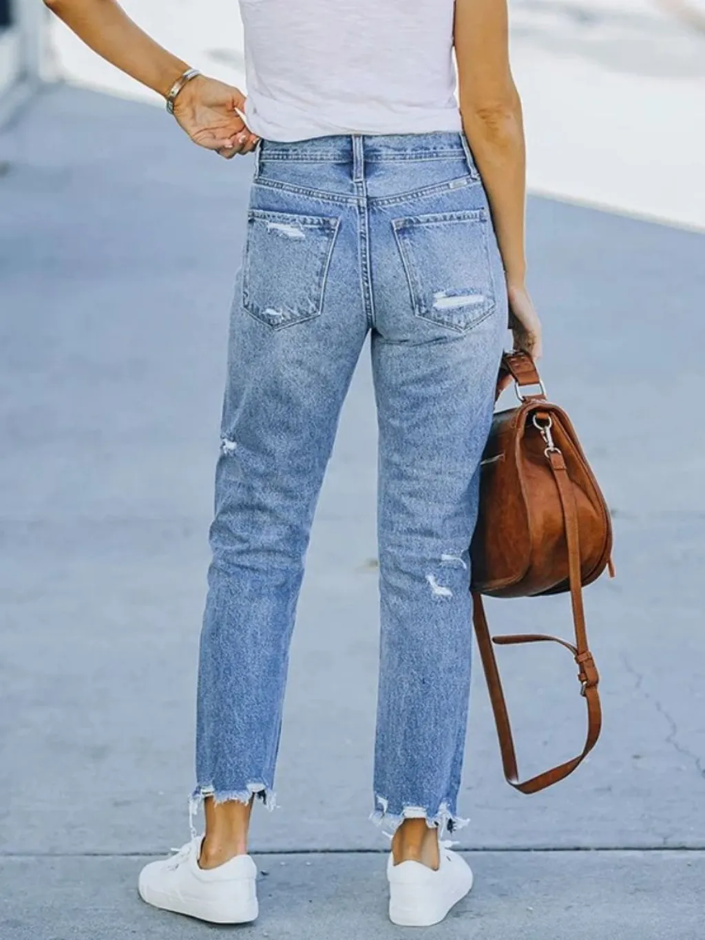 Women's Light Blue Ripped Straight-Leg Jeans — endless ways to style it