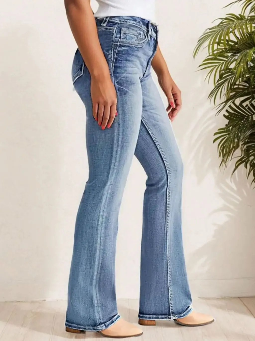 Women's Light Blue Washed Bootcut Jeans — endless ways to style it