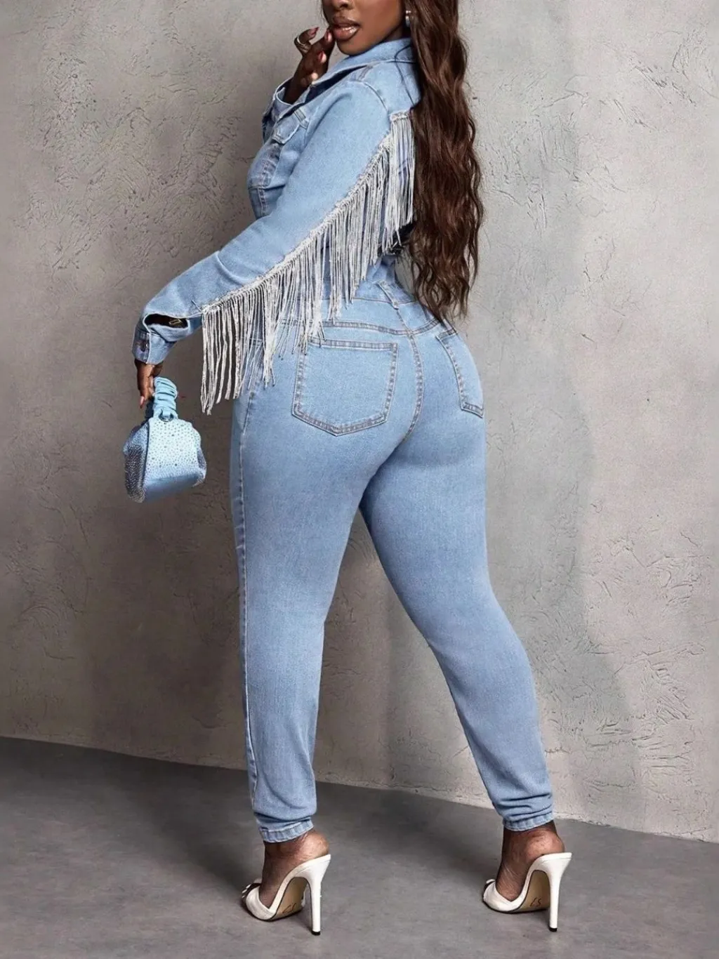 Women's Light Blue Western Fringe Denim Jumpsuit — a pair designed to be worn everywhere