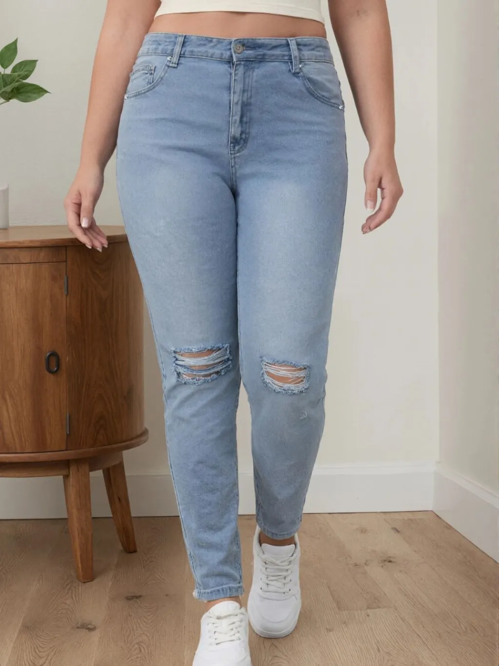 Women's Plus Size Light Blue Ripped Slim Jeans — a pair designed to be worn everywhere