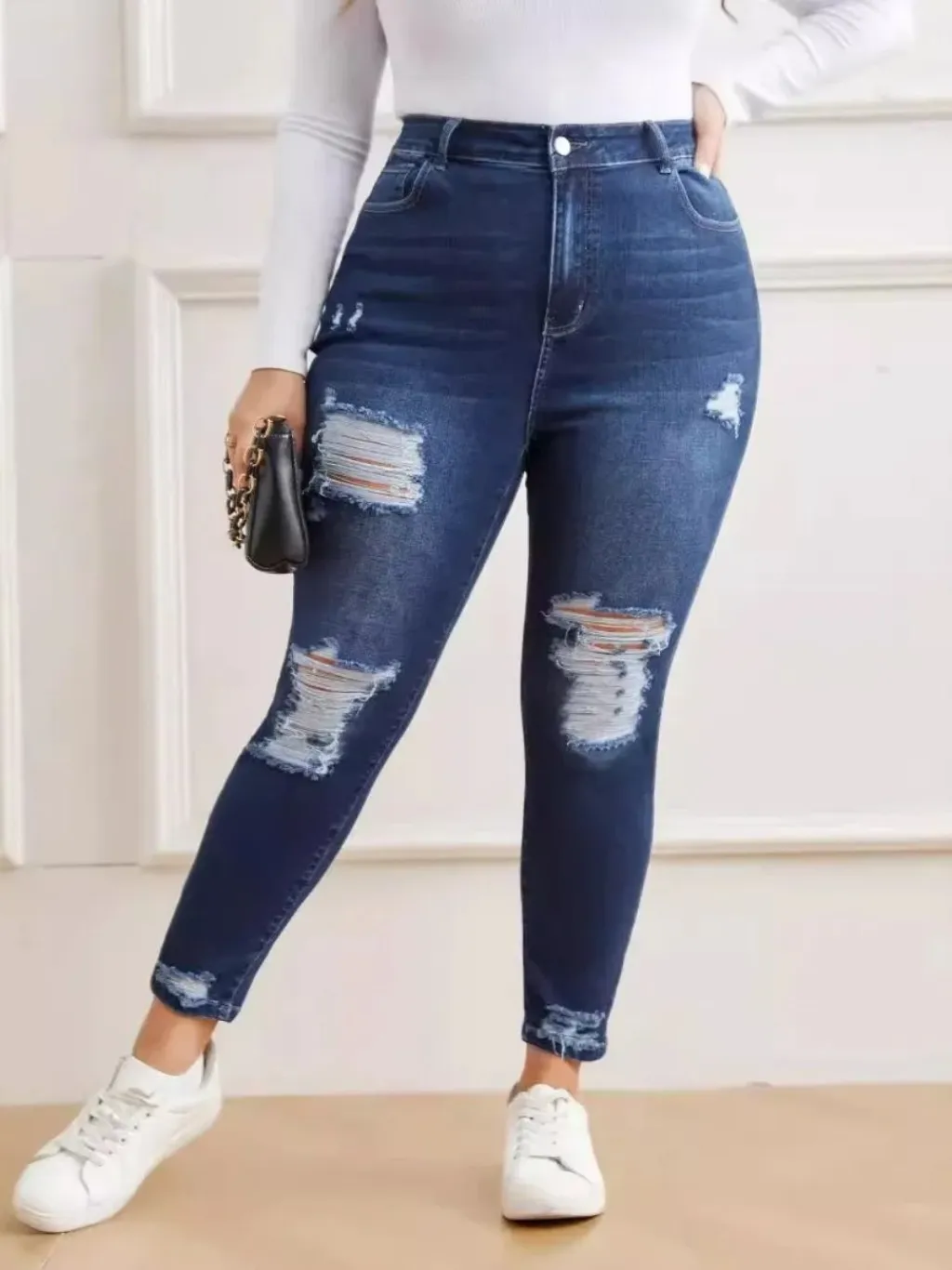 Women's Plus Size Raw Blue Ripped Denim Jeans — a pair designed to be worn everywhere