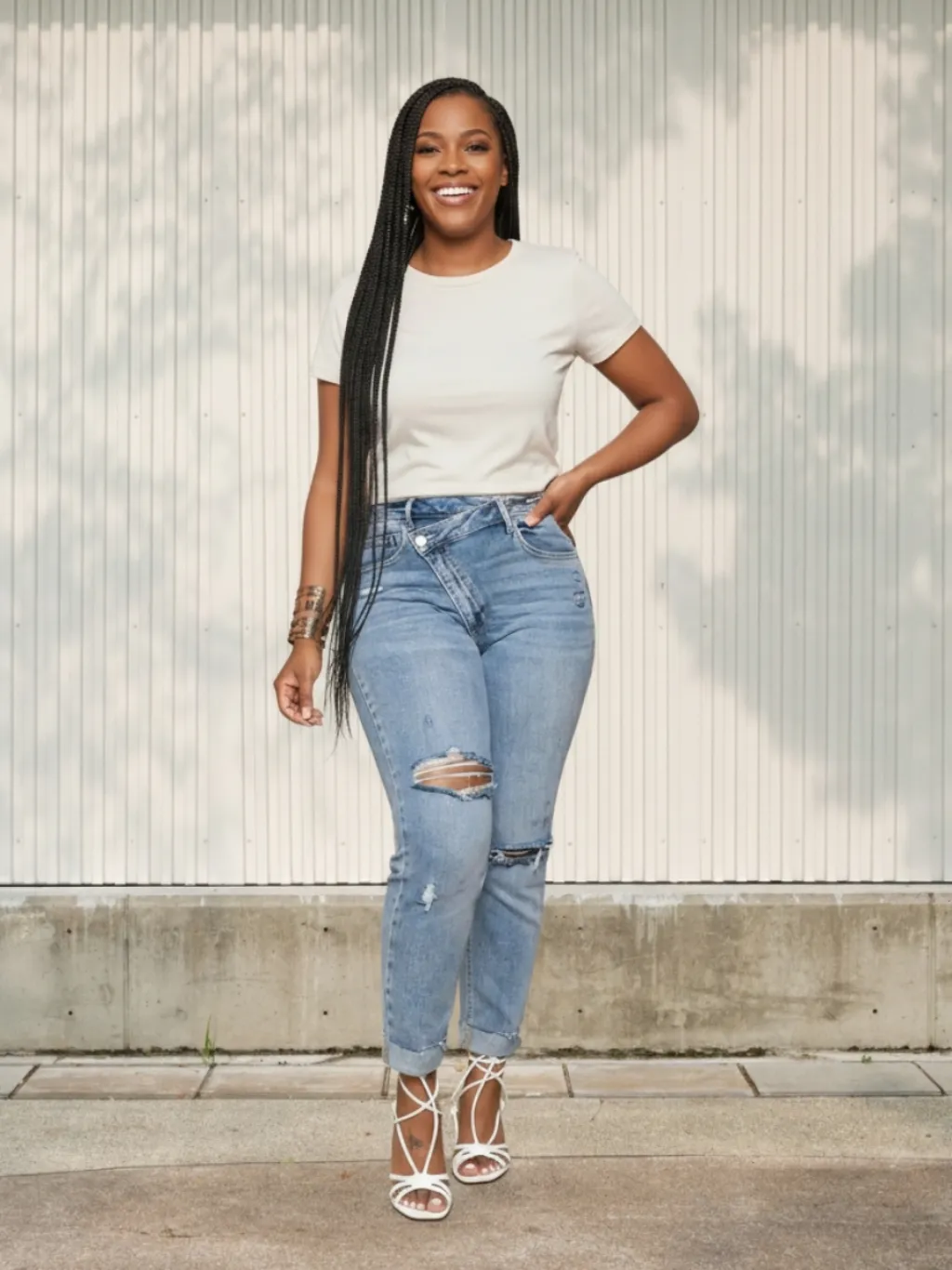 Women's Ripped Slim Jeans with Asymmetric Waist