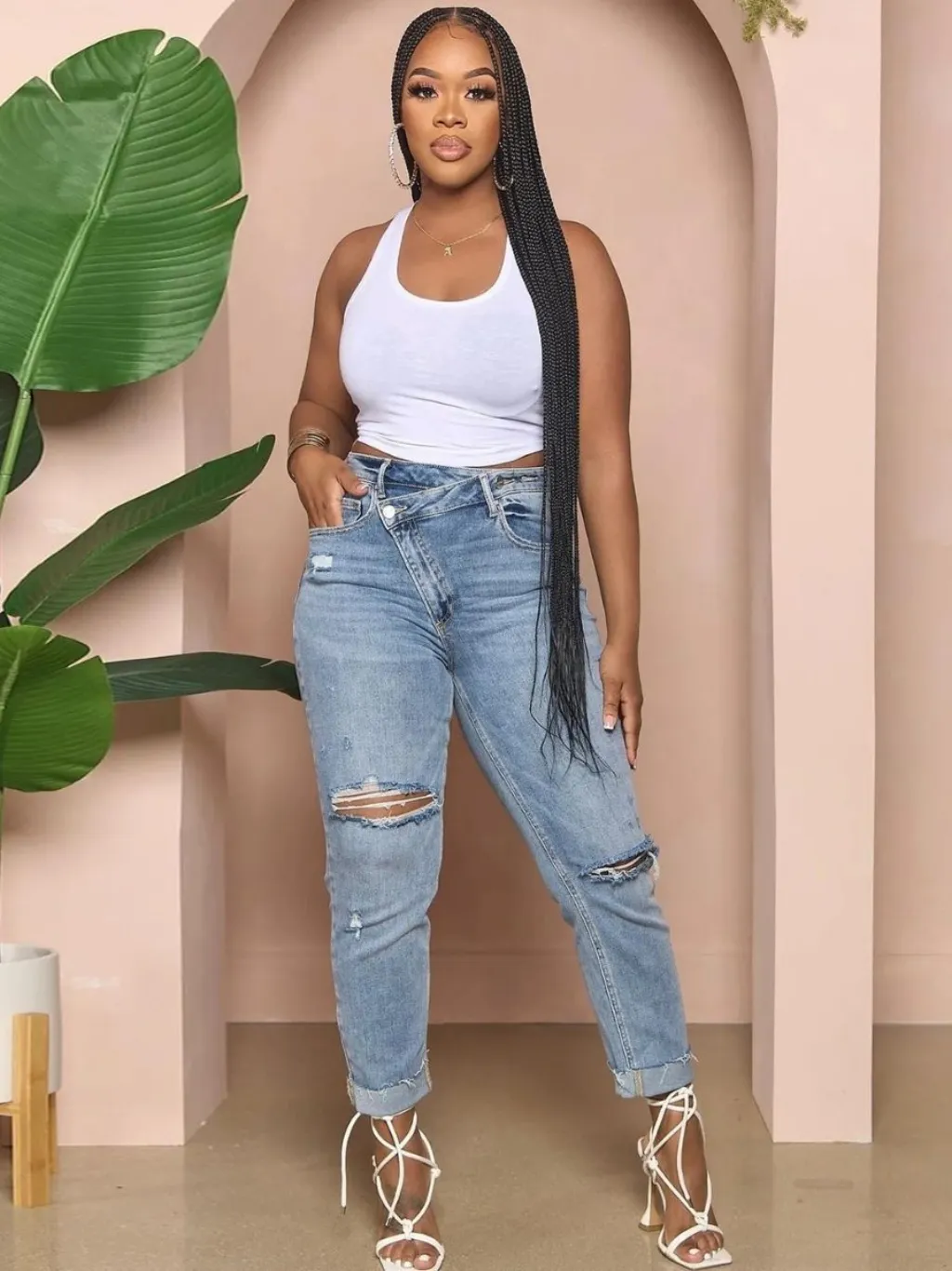 Women's Ripped Slim Jeans with Asymmetric Waist — a pair designed to be worn everywhere
