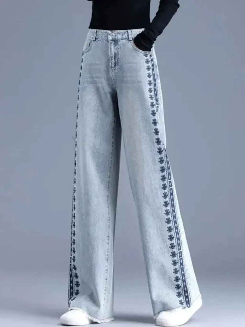 Women's Sky Blue Embroidered Flared Jeans — a pair designed to be worn everywhere