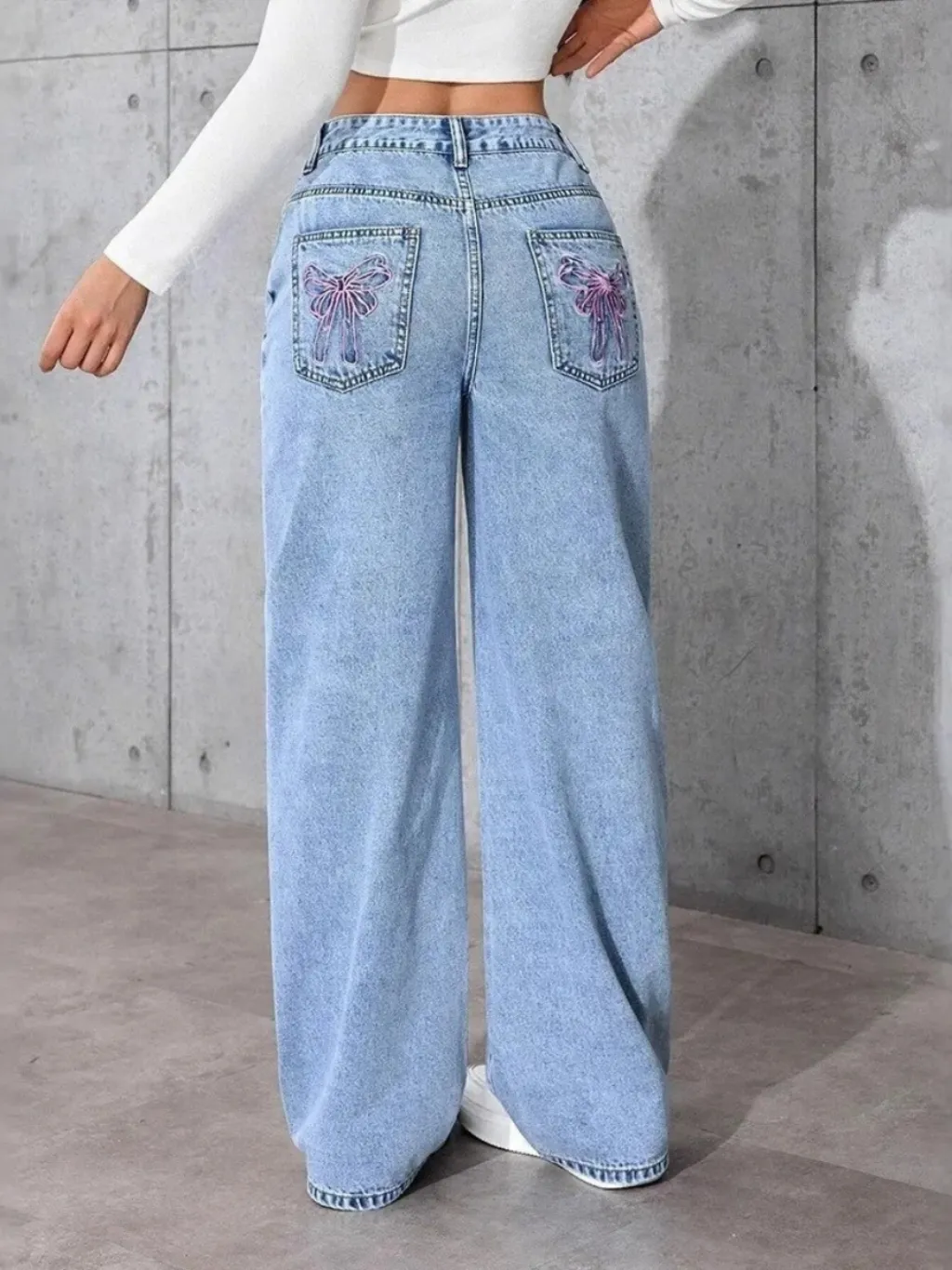 Women's Sky Blue Wide-Leg Jeans with Bow-Embroidered Pockets — quality denim, made to last