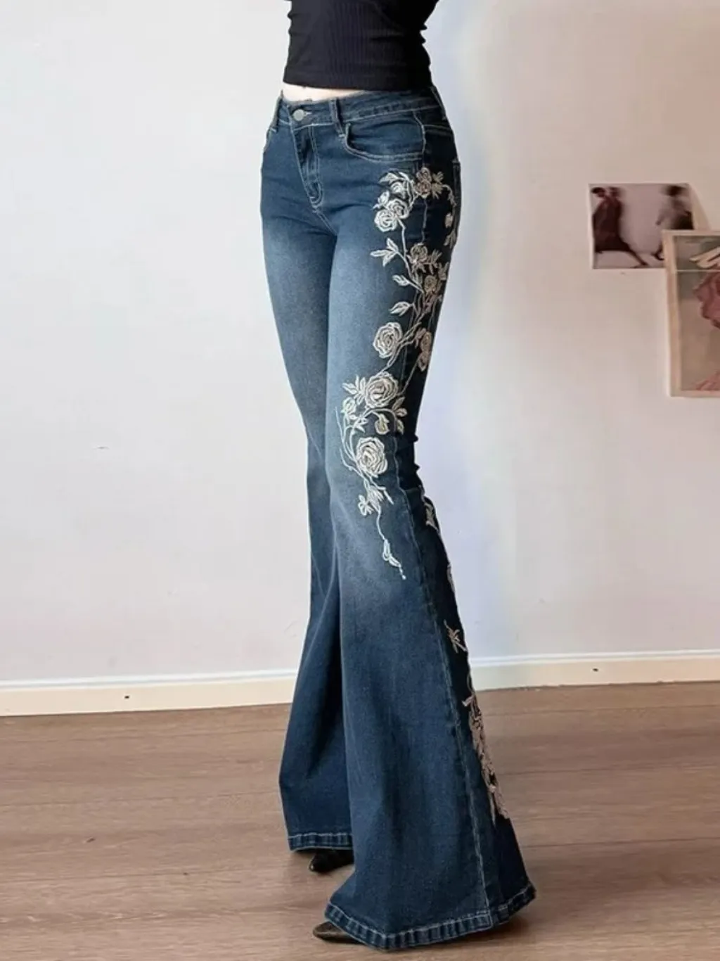 Women's Vintage Flared Jeans with White Floral Embroidery — a pair designed to be worn everywhere