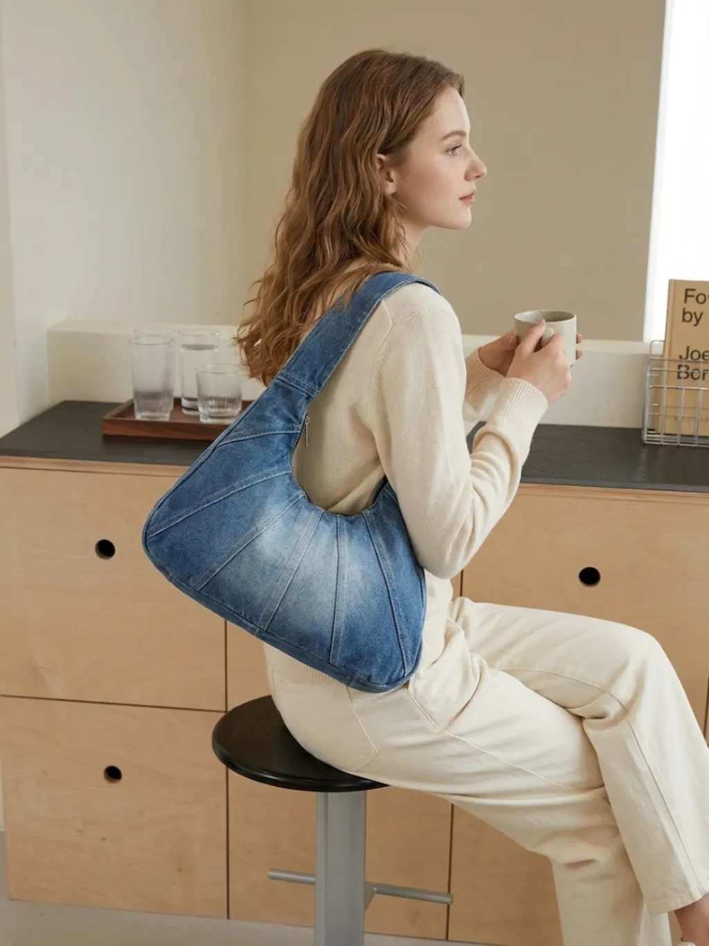 Women's Washed Denim Hobo Shoulder Bag with Exposed Seams — a pair designed to be worn everywhere