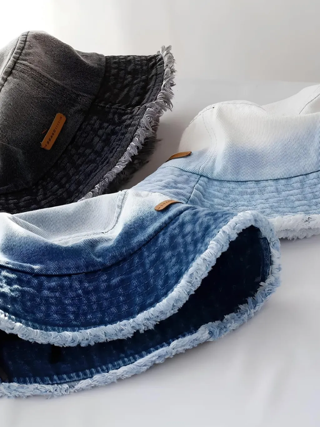 Women's Washed & Frayed Denim Bucket Hat — endless ways to style it